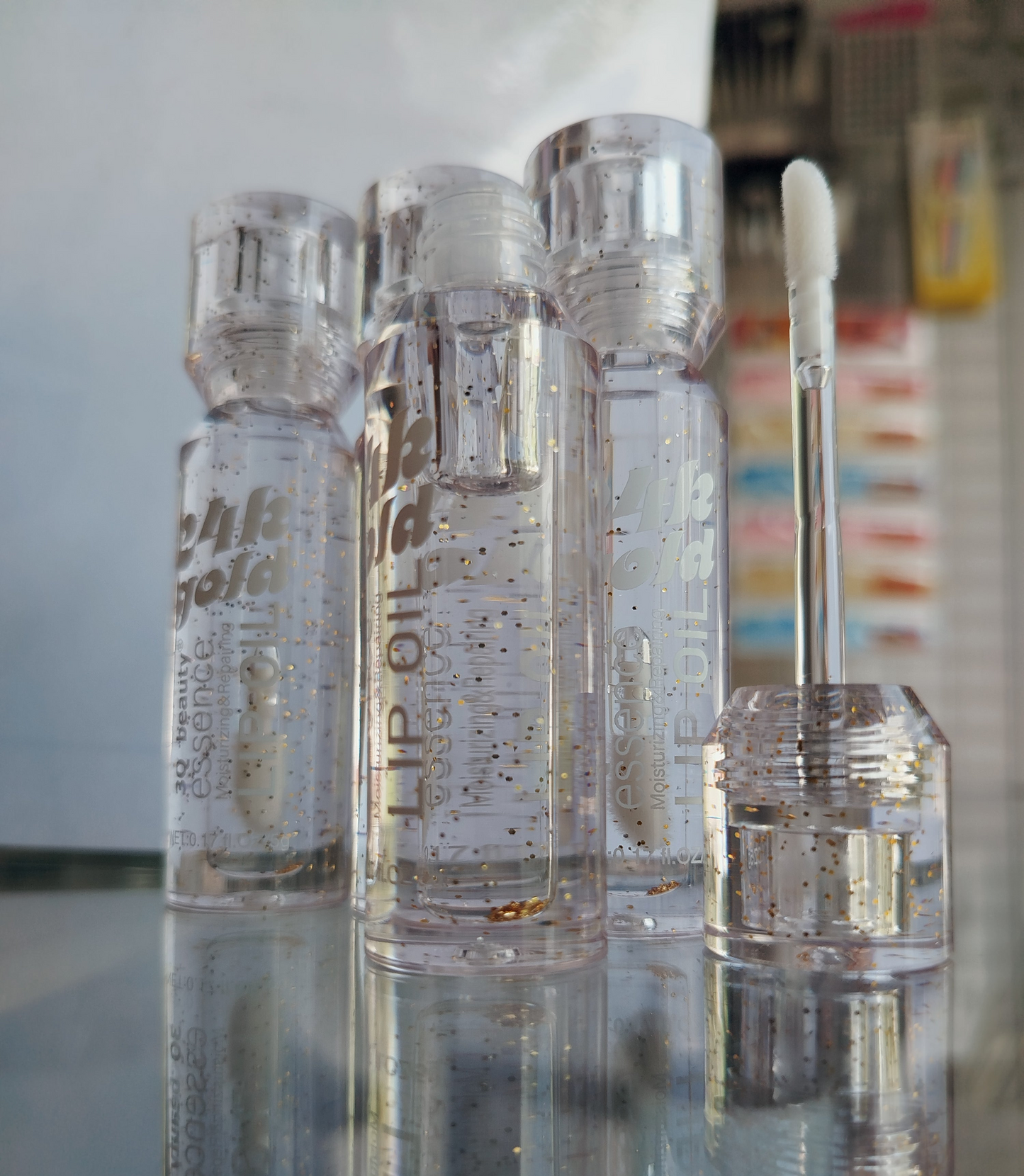 3Q Beauty 24K Gold Essence Moisturizer and Repairing Lip Oil