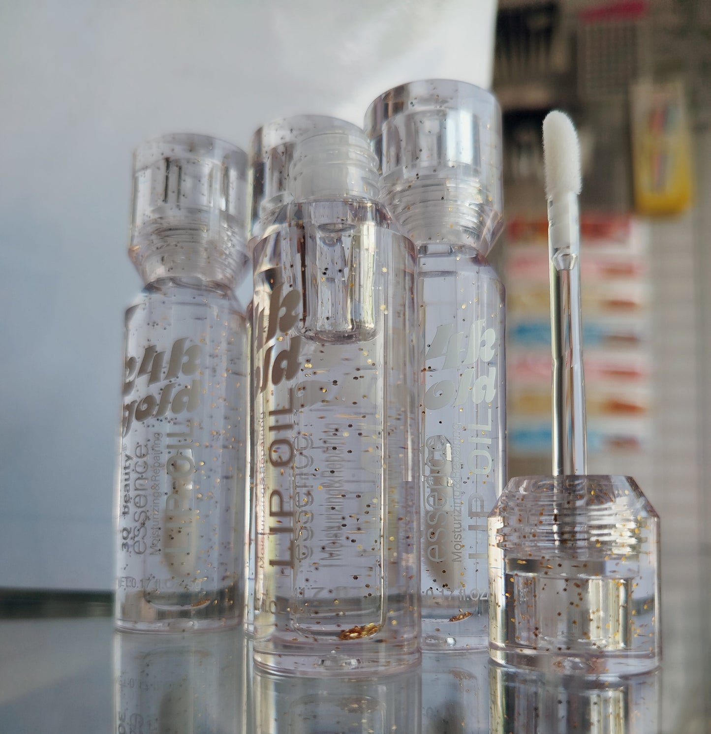 3Q Beauty 24K Gold Essence Moisturizer and Repairing Lip Oil